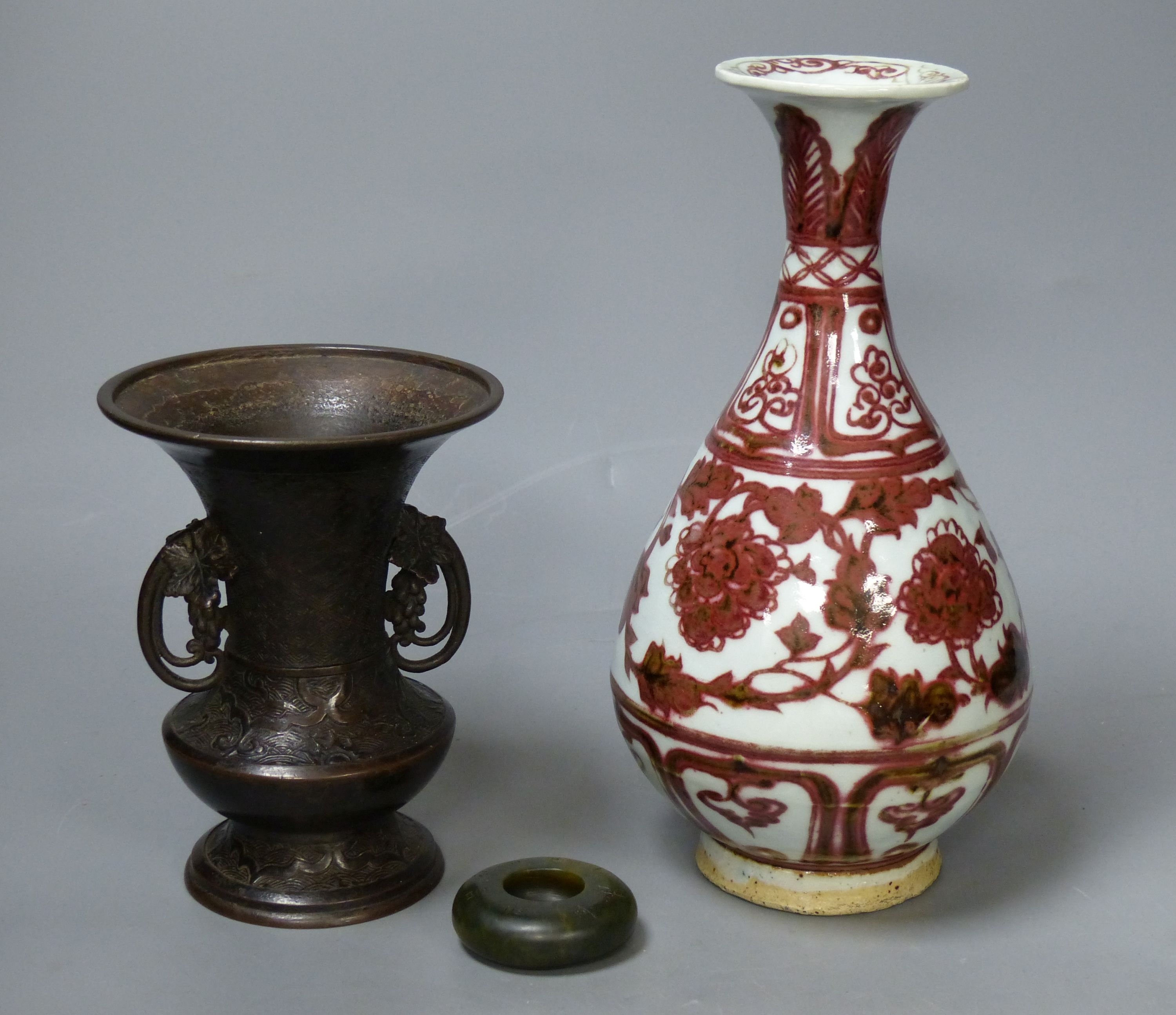 A Chinese underglaze copper red vase, an archaistic bronze vase and a hardstone brushwasher, tallest 25cm